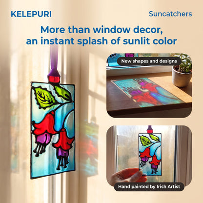 A colorful stained-glass-style suncatcher with red foxes and green leaves hanging in a window, shown alongside inset photos of the product in use and promotional text. Brand name KELEPURI appears at top left, and 'Suncatchers' appears at top right.